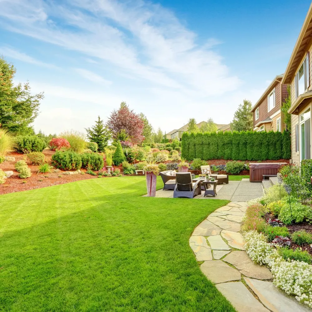 Custom landscape installation for residential properties in Manor, TX by Elgin Landscaping, Tree & Lawn