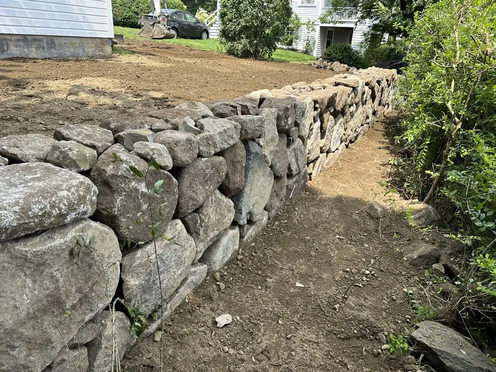 Affordable landscape installation with custom design across Lynn, MA - Eligio & Son Masonry & Landscaping