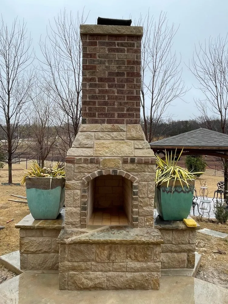 Custom garden landscaping for year-round maintenance in Moore, OK by Elion Landscaping & Tree Service