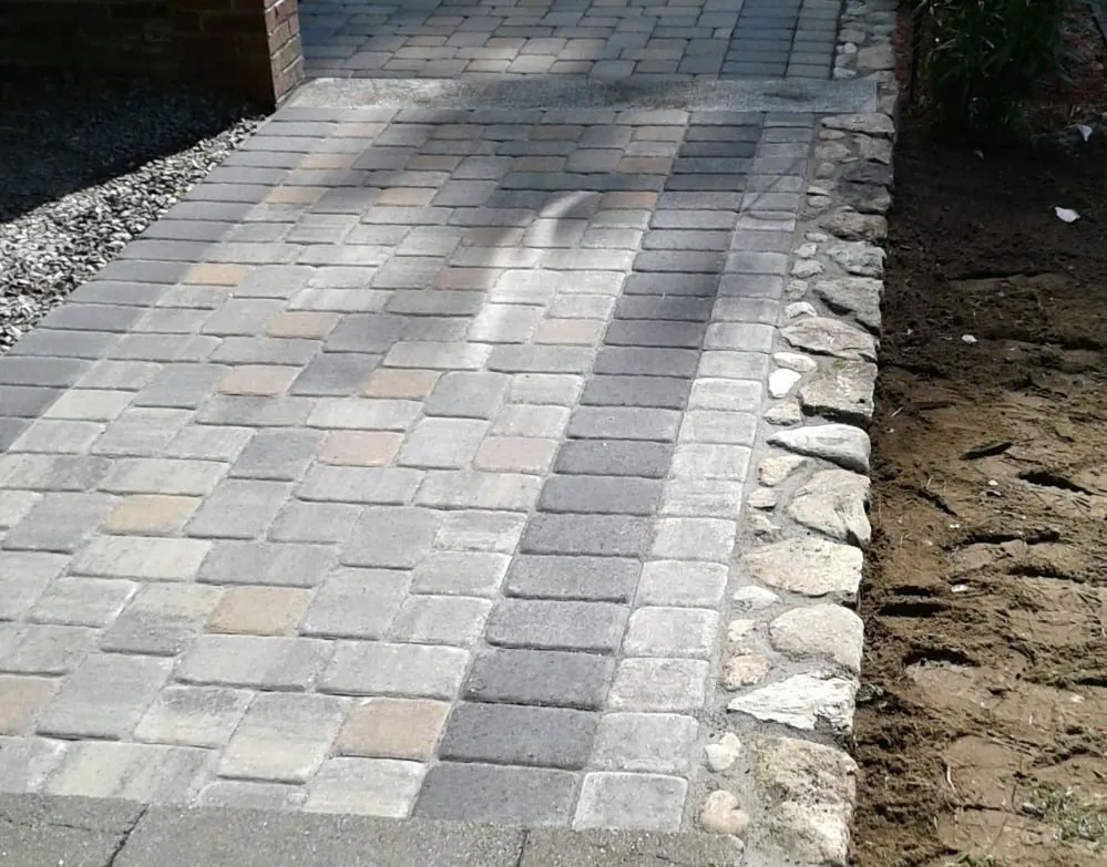 Affordable yard cleanup service with custom design in Framingham, MA by Elios Landscaping