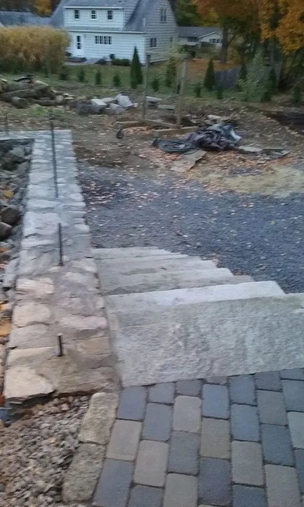 Affordable lawn care service in Framingham, MA by Elios Landscaping