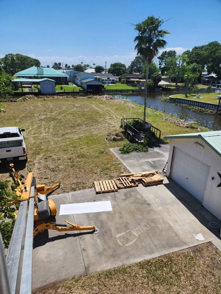 Custom yard cleanup service for year-round maintenance in Okeechobee, FL by Eli's Lawn Care