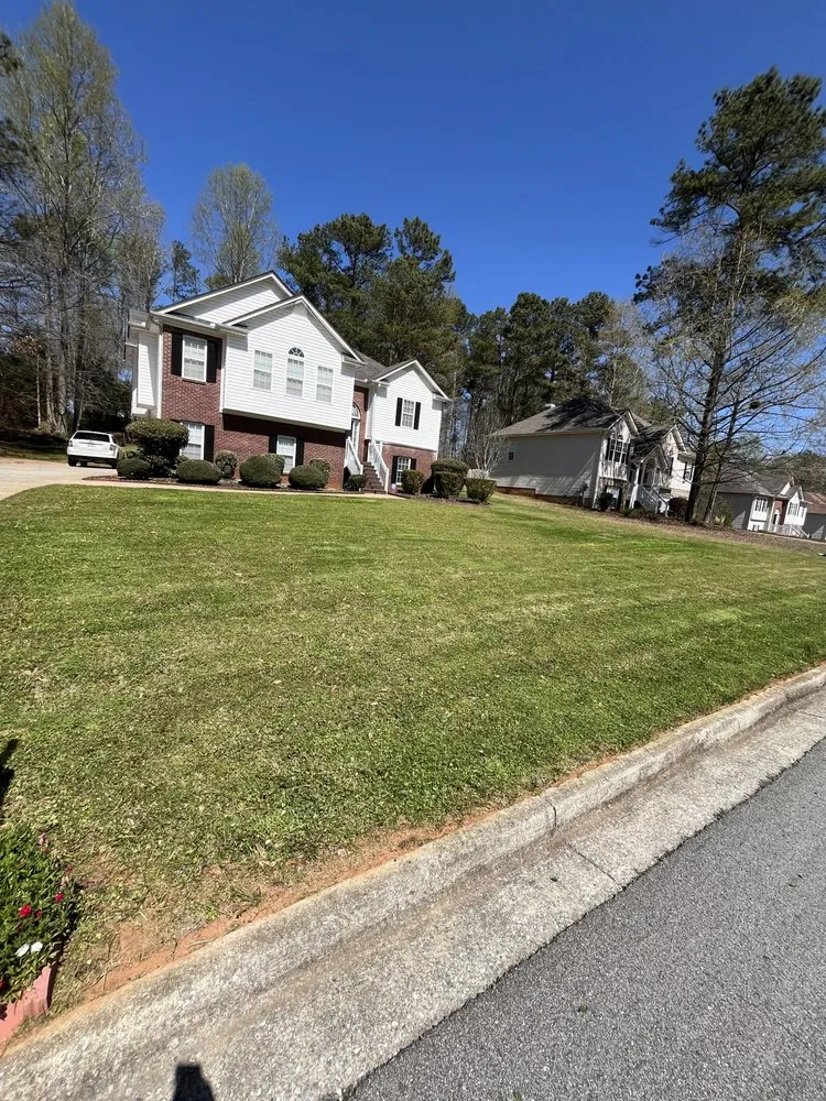 Professional lawn care service with custom design in Powder Springs, GA by Elite Brothers Landscaping