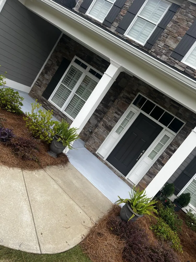 Custom landscape installation for outdoor upgrades in Phenix City, AL by ELITE Concrete Curbing