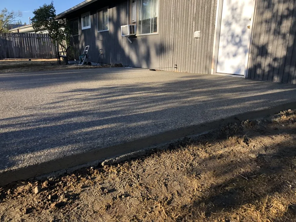 Trusted lawn mowing service for year-round maintenance in Lakewood, WA by Elite Concrete