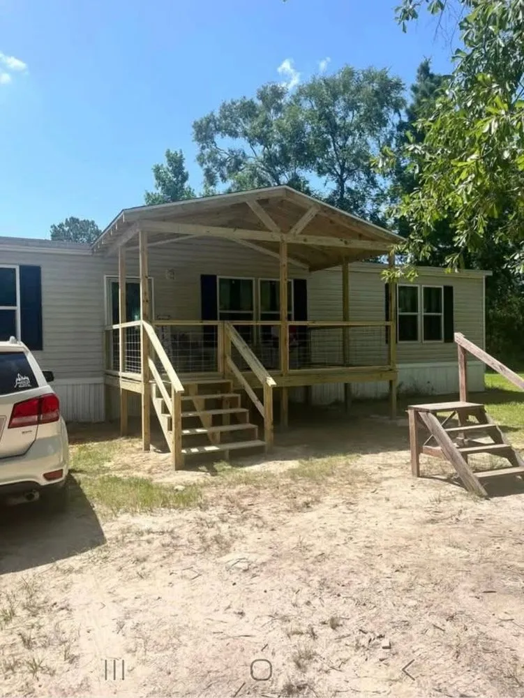 Reliable lawn mowing service with custom design in Jasper, TX by Elite Construction Services