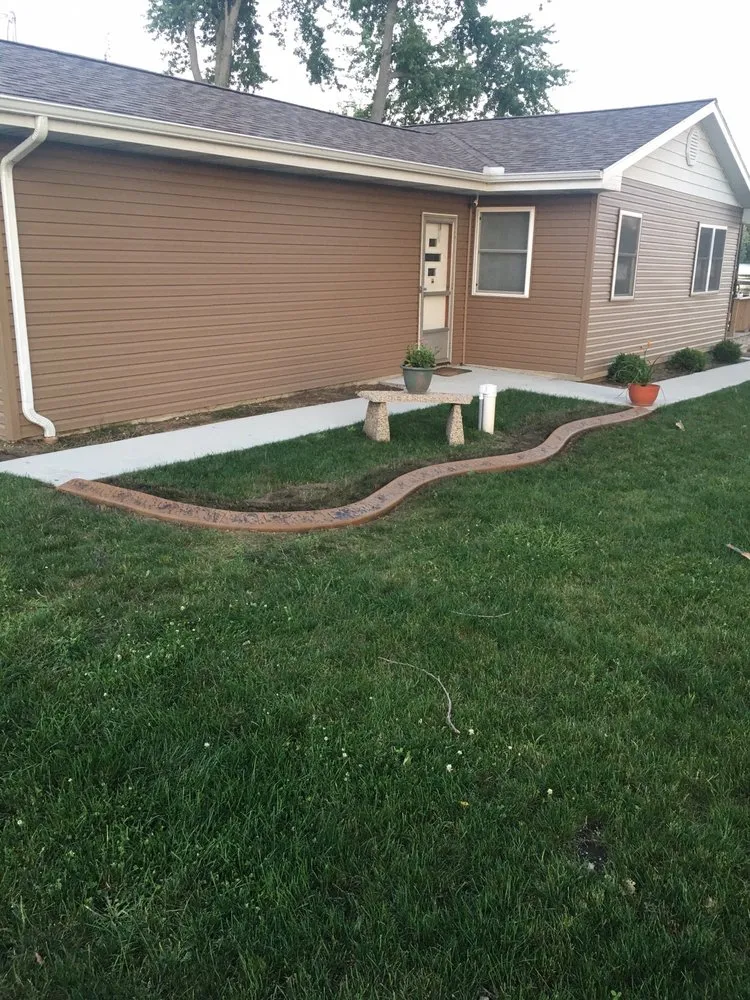 Reliable lawn mowing service with custom design in Millersburg, IN by Elite Curbing