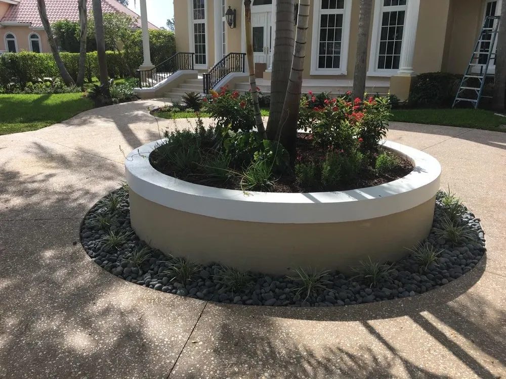 Local lawn mowing service for residential properties in Boynton Beach, FL by Elite Landscape Concepts