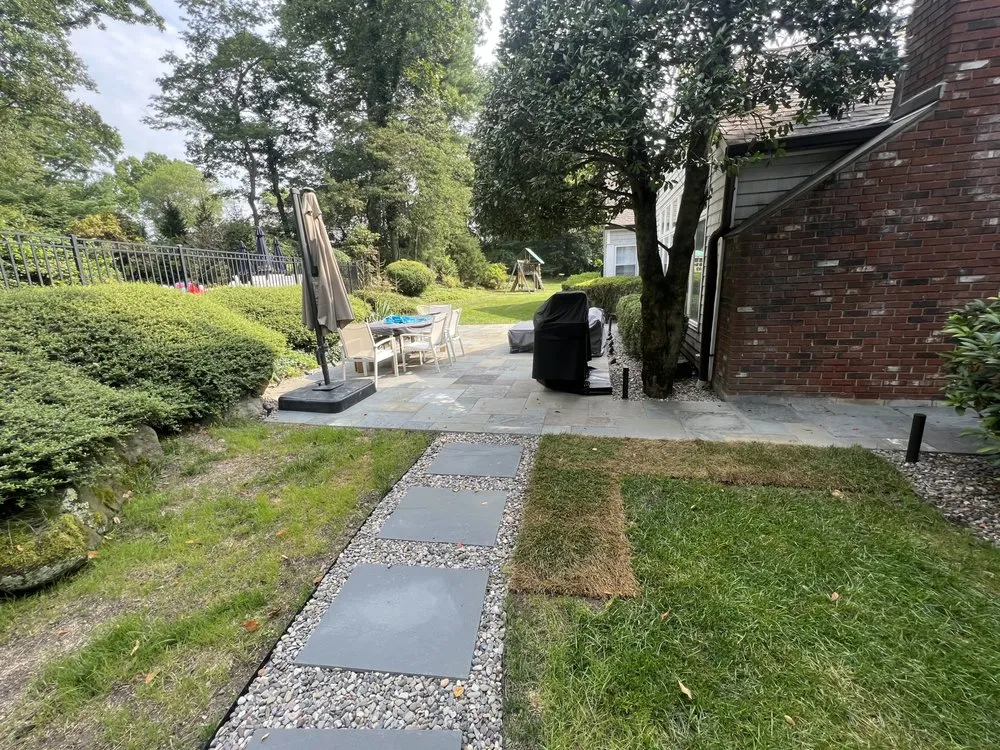 Custom yard cleanup service for year-round maintenance across Norwalk, CT - Elite Landscape