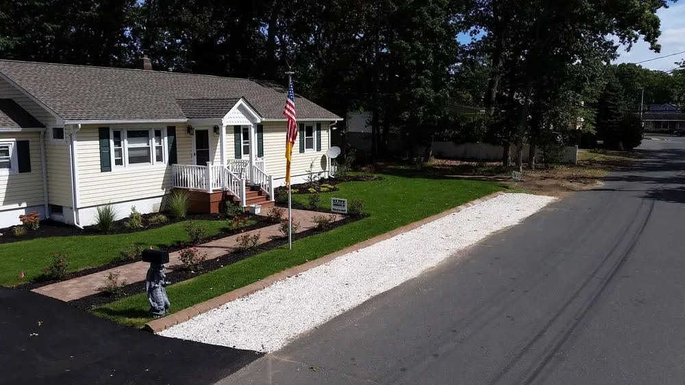 Trusted lawn mowing service with custom design in Spotswood, NJ by Elite Landscapes of NJ