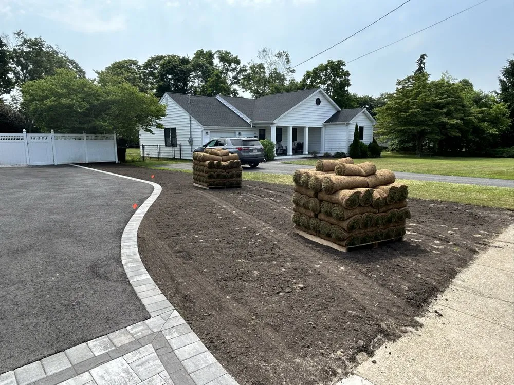 Local yard cleanup service with custom design in West Sayville, NY by Elite Landscaping & Maintenance