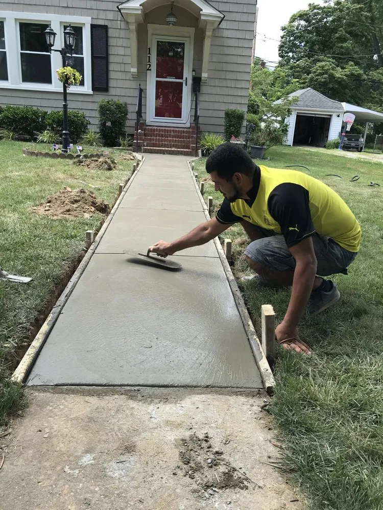 Professional yard cleanup service with custom design in Highland Beach, MD by Elite Landscaping & Tree Removal