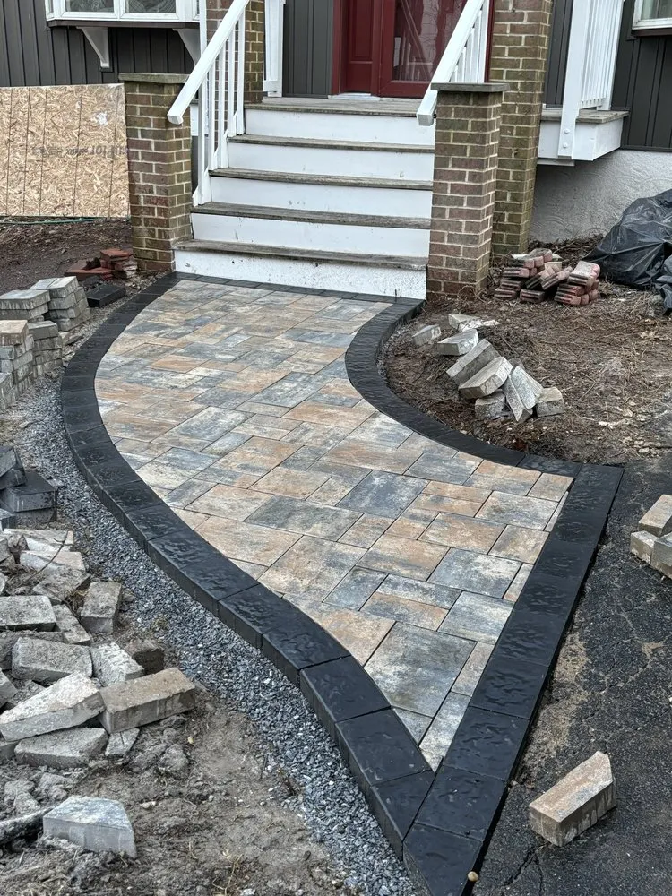 Affordable lawn care service for residential properties in Highland Beach, MD by Elite Landscaping & Tree Removal