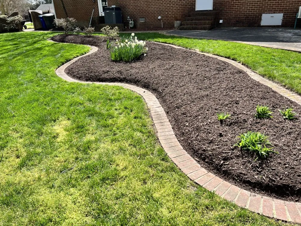 Professional landscaping services for homes in Newport News, VA by Elite Lawn and Landscaping