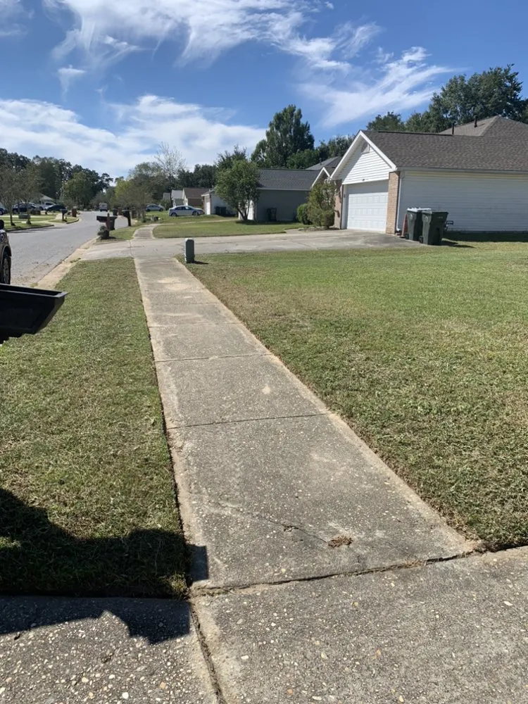 Professional lawn mowing service for homes in Pensacola, FL by Elite Lawn care 850
