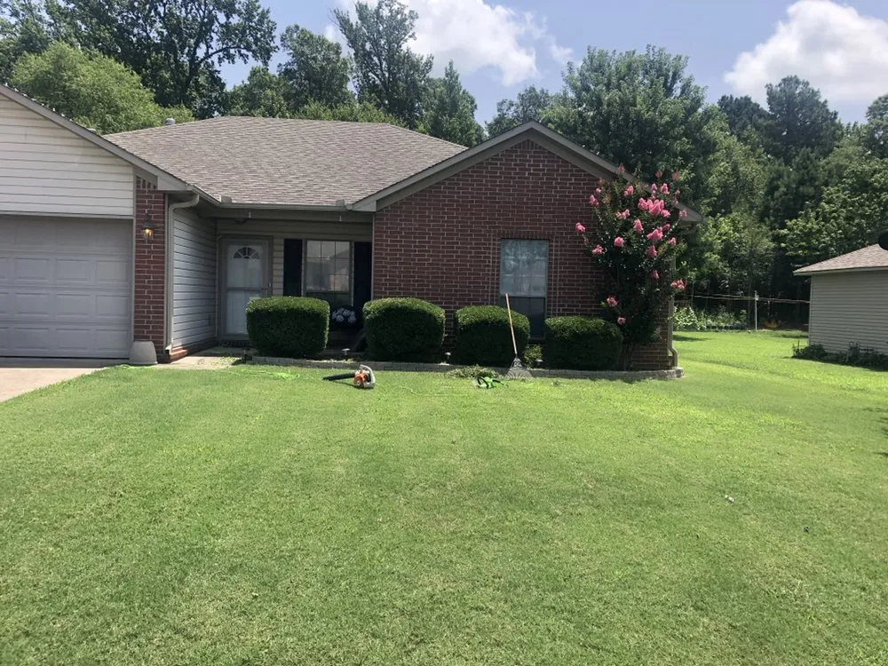 Custom landscape installation in Cabot, AR by Elite Lawn Pros