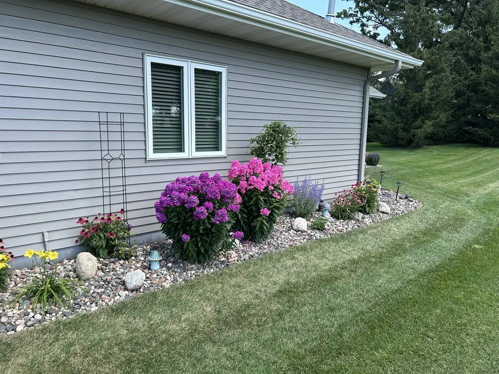 Expert yard cleanup service for year-round maintenance in Owatonna, MN by Elite Lawns