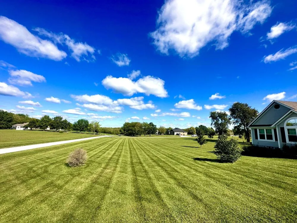 Custom landscape installation in Leawood, KS by Elite Lines Lawn and Landscape