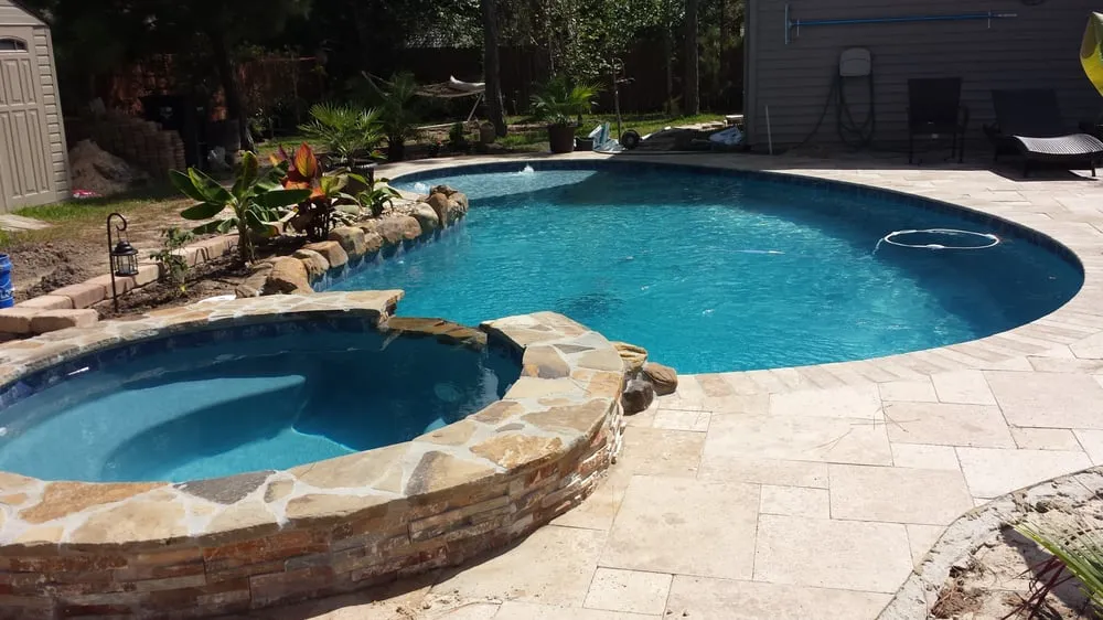Expert lawn care service for residential properties in Mandeville, LA by Elite Pools and Spas