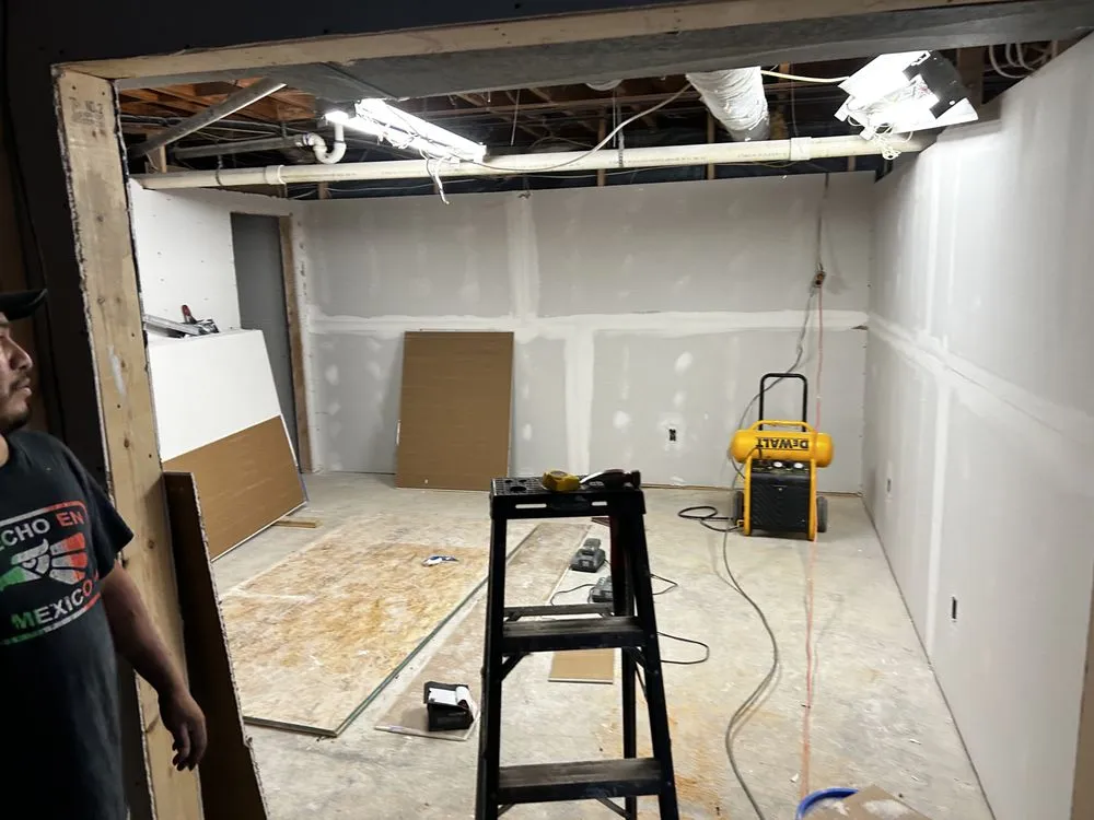 Affordable lawn mowing service for outdoor upgrades in Tuscaloosa, AL by Elite Renovation & Construction