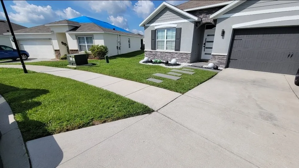 Reliable lawn mowing service in Polk City, FL by Elohim Lawncare Services