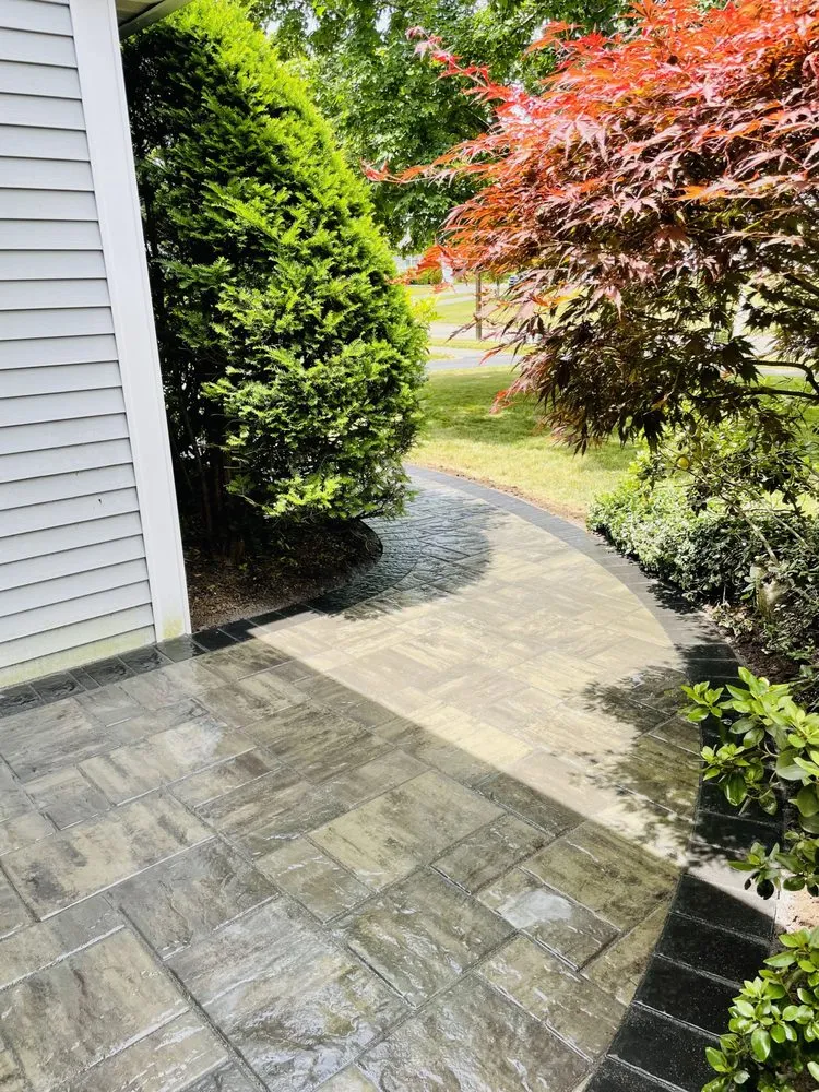 Custom yard cleanup service in Windsor, CT by Elyon Construction and Stoneworks