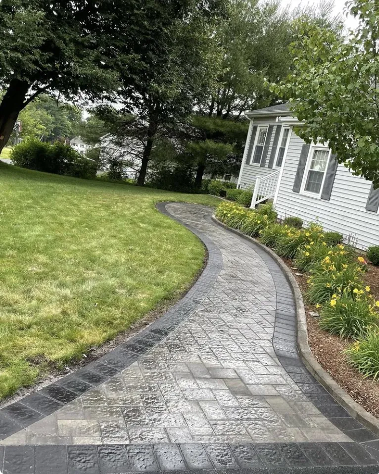 Custom landscape design for homes in Windsor, CT by Elyon Construction and Stoneworks