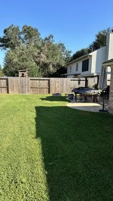 E&M Landscaping Logo