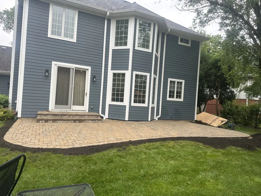 Professional lawn mowing service with custom design in Waukegan, IL by EM Landscaping