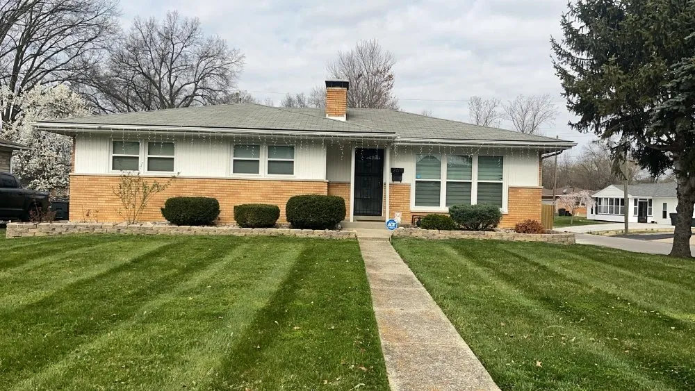 Expert yard cleanup service for year-round maintenance in New Albany, IN by Emanuel Lawn Mowing