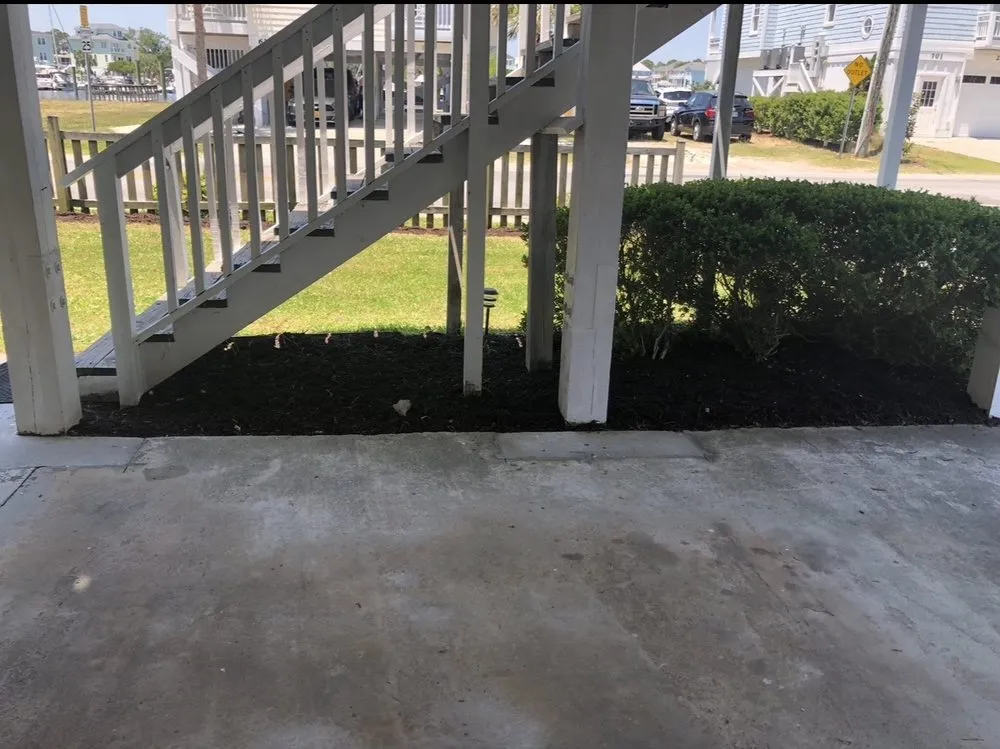 Custom lawn care service with custom design in Harrells, NC by Embark Property Solutions