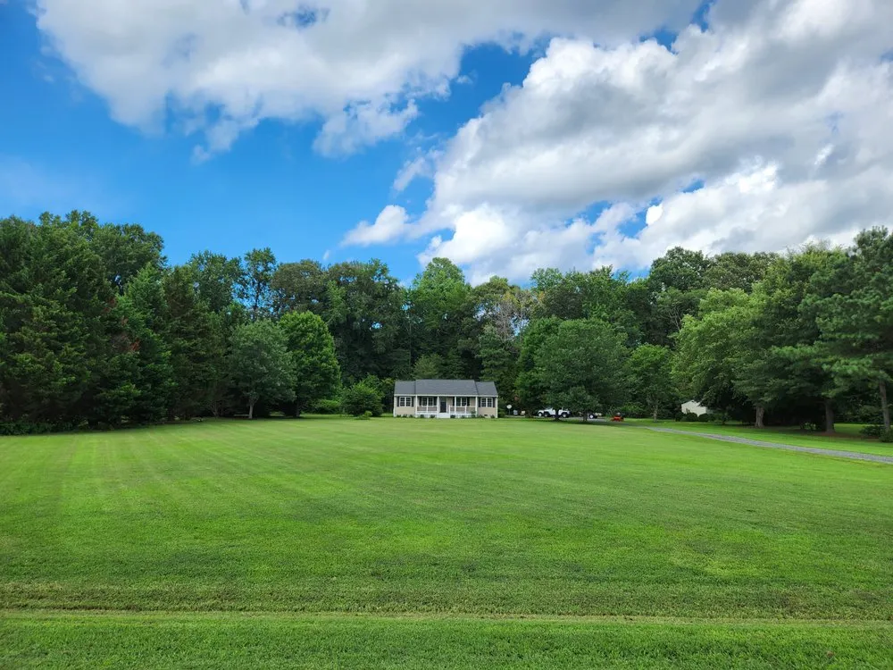 Professional landscape design for year-round maintenance in Spotsylvania Courthouse, VA by Ember's Lawn and Yard Services