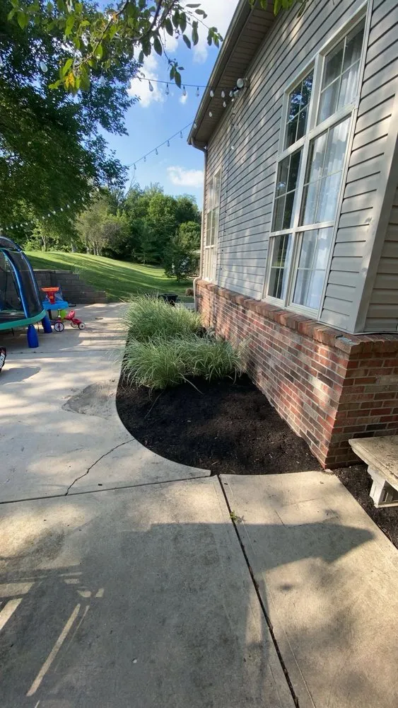 Professional yard maintenance in Greenwood, IN by Emberton Landscapes