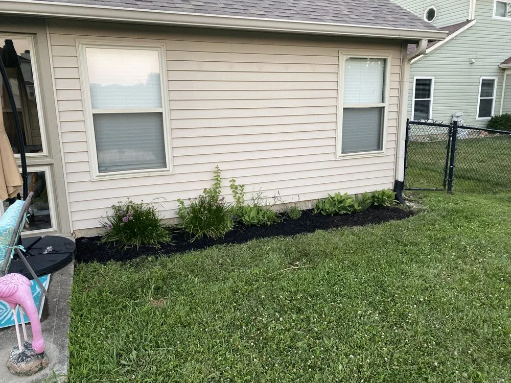 Professional outdoor landscaping with custom design in Greenwood, IN by Emberton Landscapes