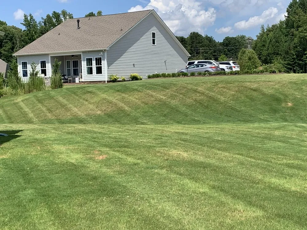 Professional yard cleanup service in Charlotte, NC by Emerald Arrow Lawn Care and Landscaping