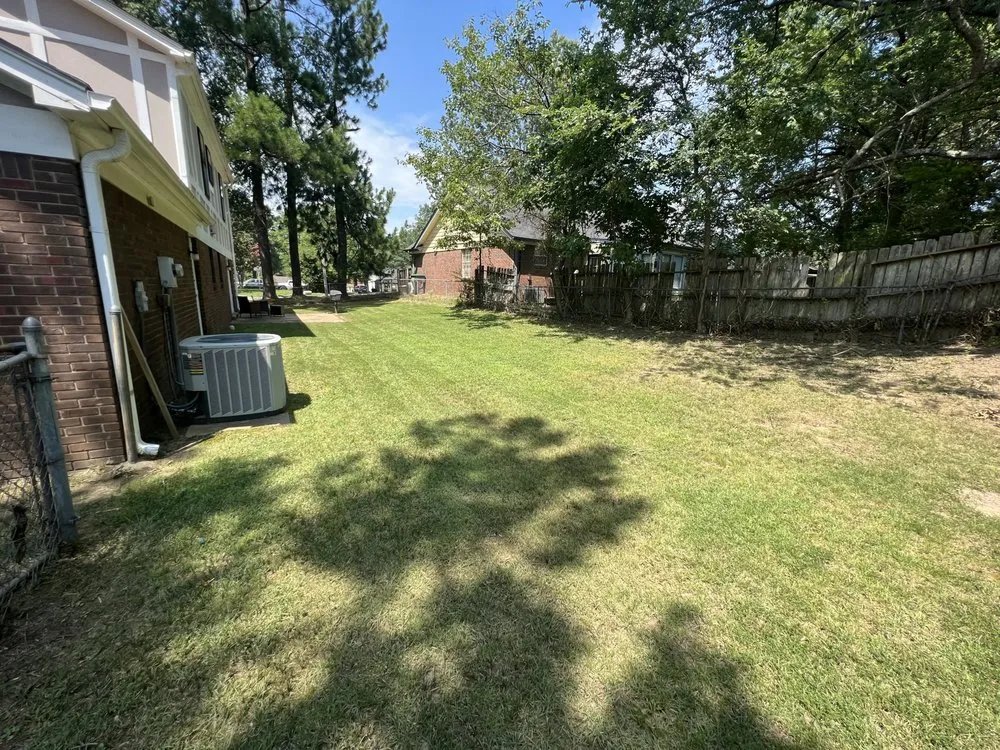 Custom landscaping services for beautiful yards in Memphis, TN by Emerald Bloom Lawncare