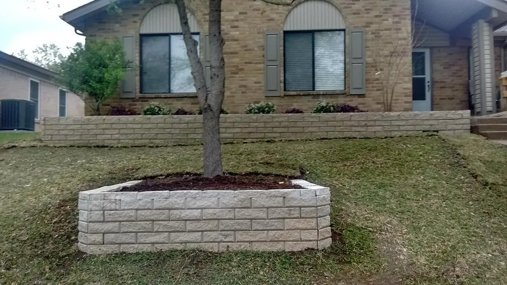 Affordable landscape design for homes in Garland, TX by Emerald Lake Landscaping
