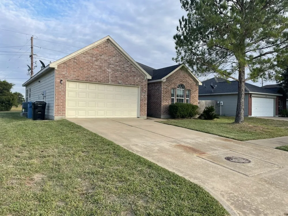 Custom garden landscaping for outdoor upgrades in Hockley, TX by Emerald Lawn Care