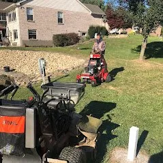 Expert lawn mowing service for year-round maintenance across Lawrenceburg, IN - Emerald Outdoor Services