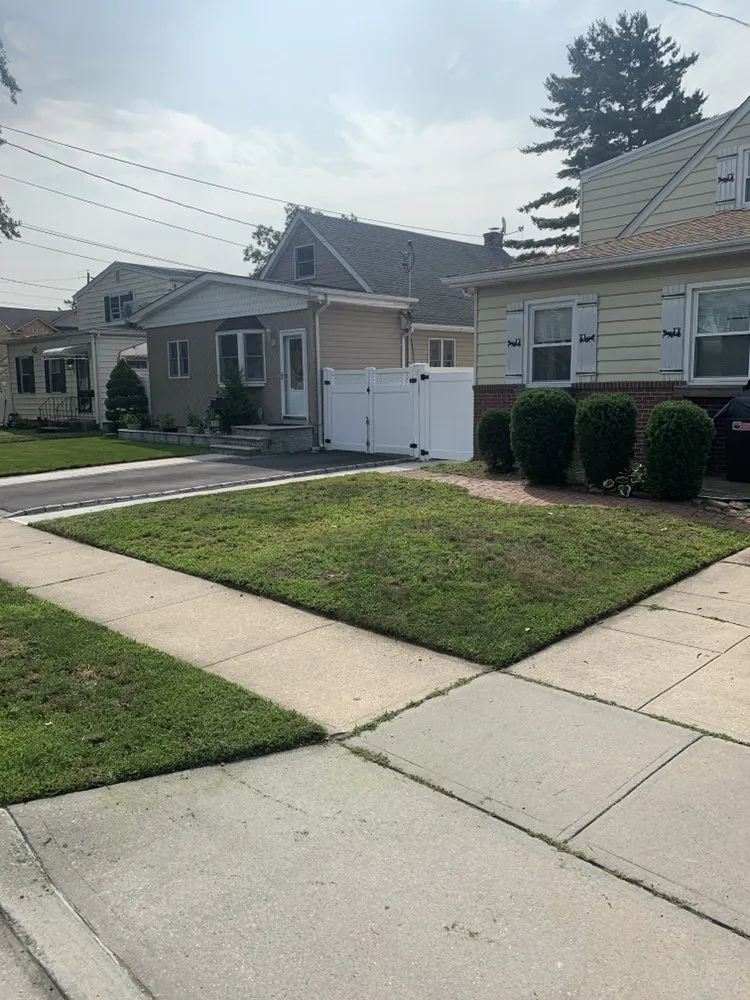 Local outdoor landscaping for homes in Queens, NY by Emmans Lawn And Roof Cleaning