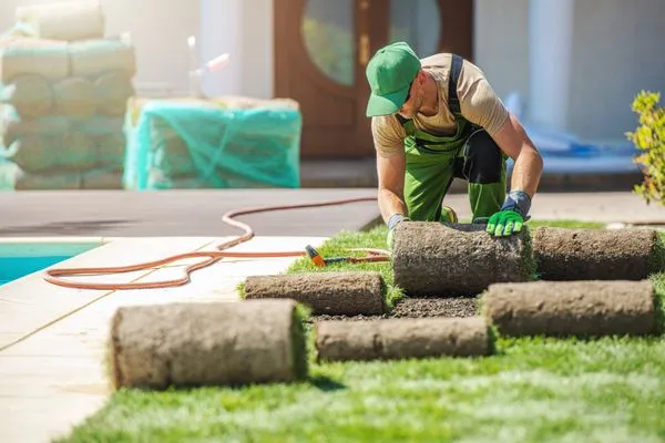Emmanuel Martinez Lawn Service Logo