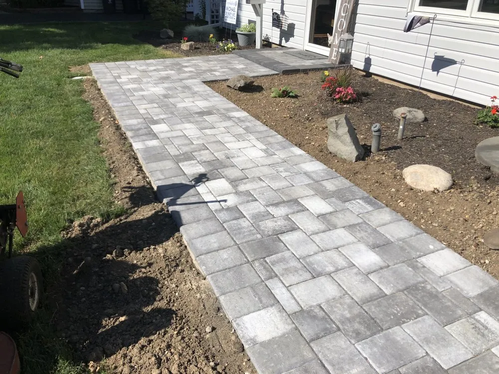 Custom yard cleanup service for residential properties in Bethpage, NY by Empire Creators