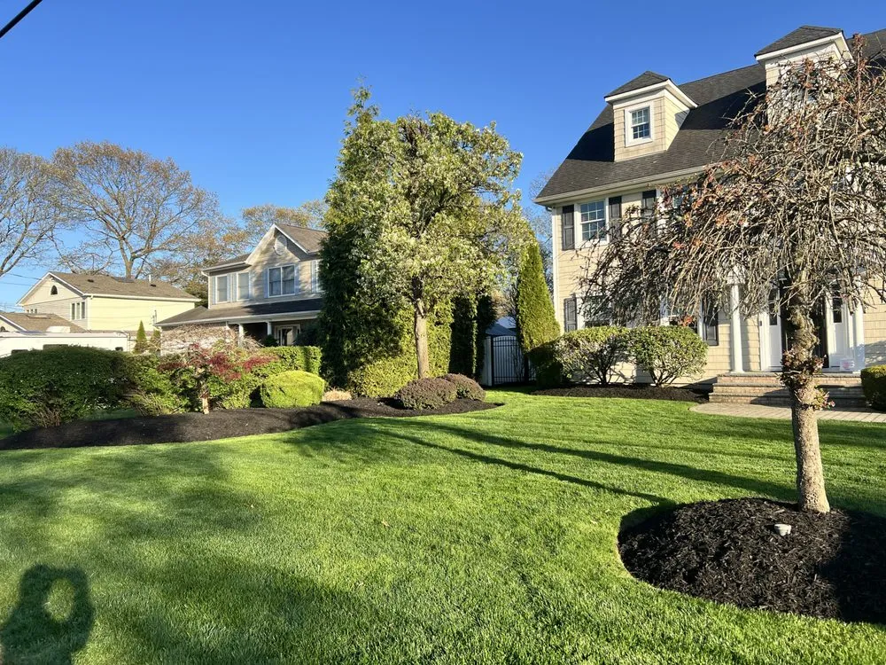 Local yard cleanup service for homes in Central Islip, NY by Empire Landscape