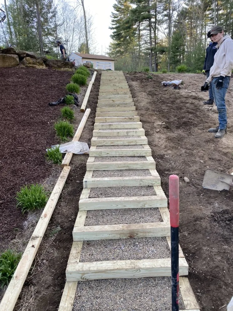 Professional yard maintenance for residential properties in Granby, MA by Empire Landscaping