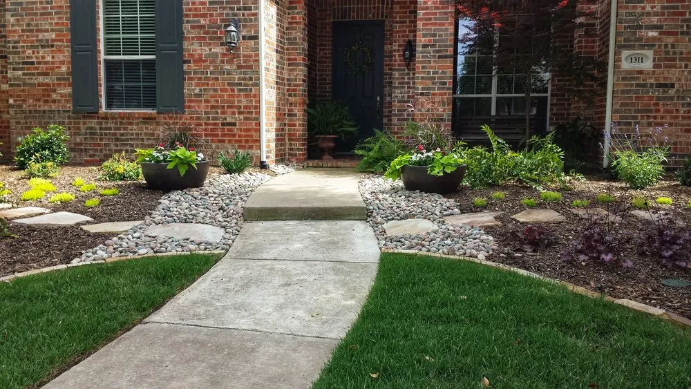 Expert yard maintenance for year-round maintenance in Plano, TX by Empire Landscaping