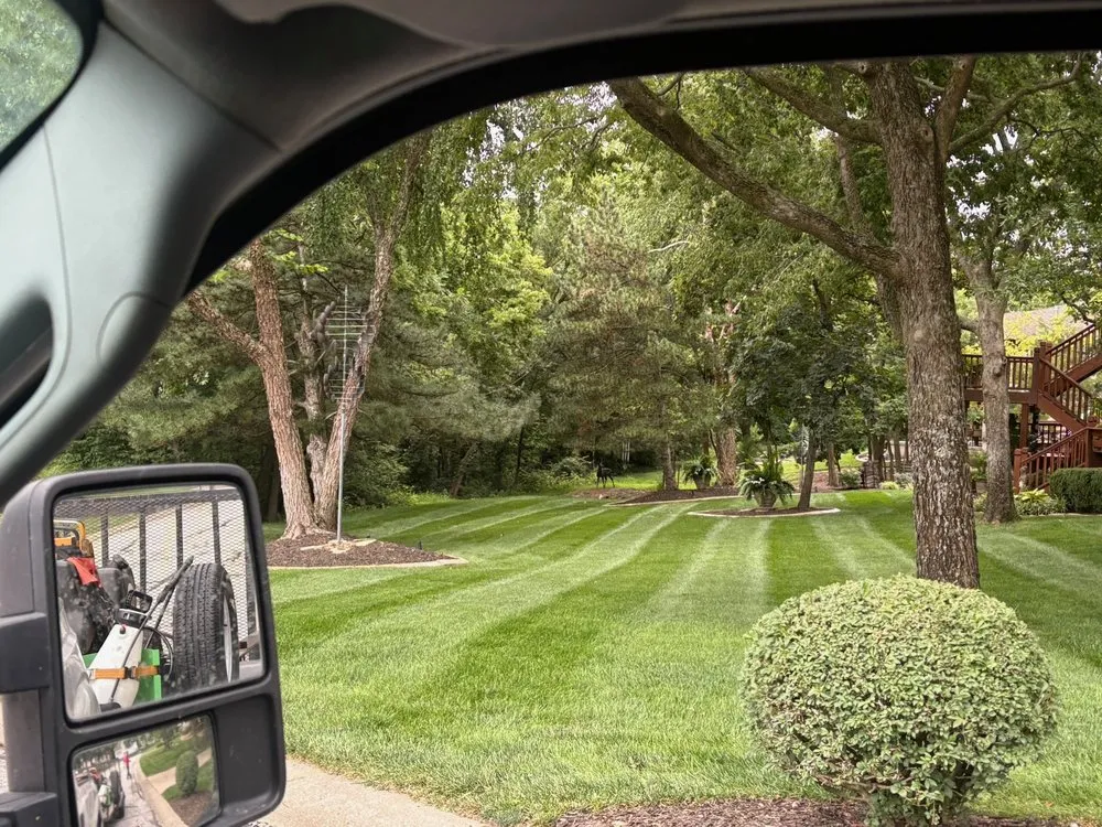 Custom outdoor landscaping with custom design in Lee's Summit, MO by Empire Lawn and Landscaping