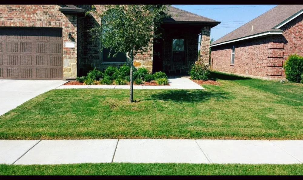 Expert lawn mowing service for residential properties in Arlington, TX by Empire Lawn Care