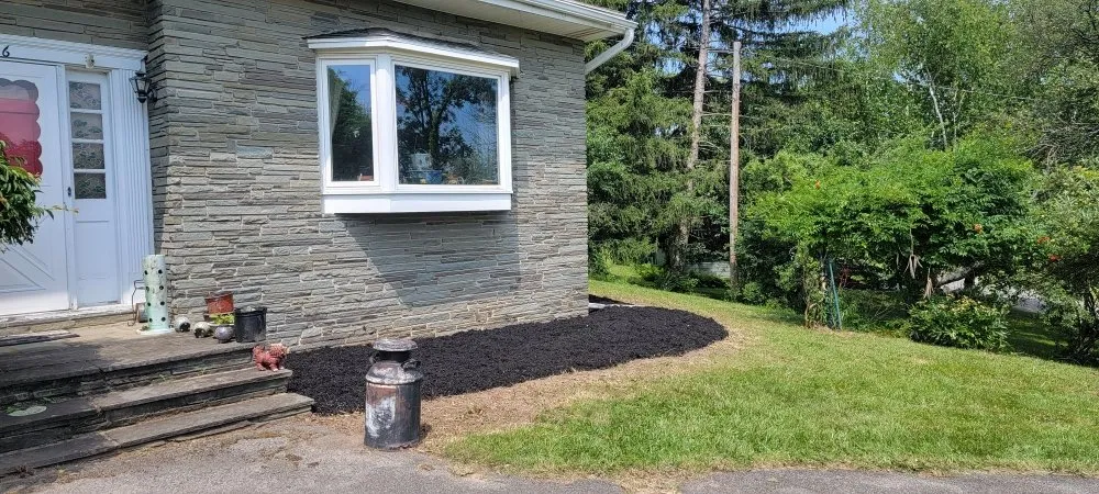 Trusted landscaping services for residential properties in Canandaigua, NY by Empire Lawn Maintenace