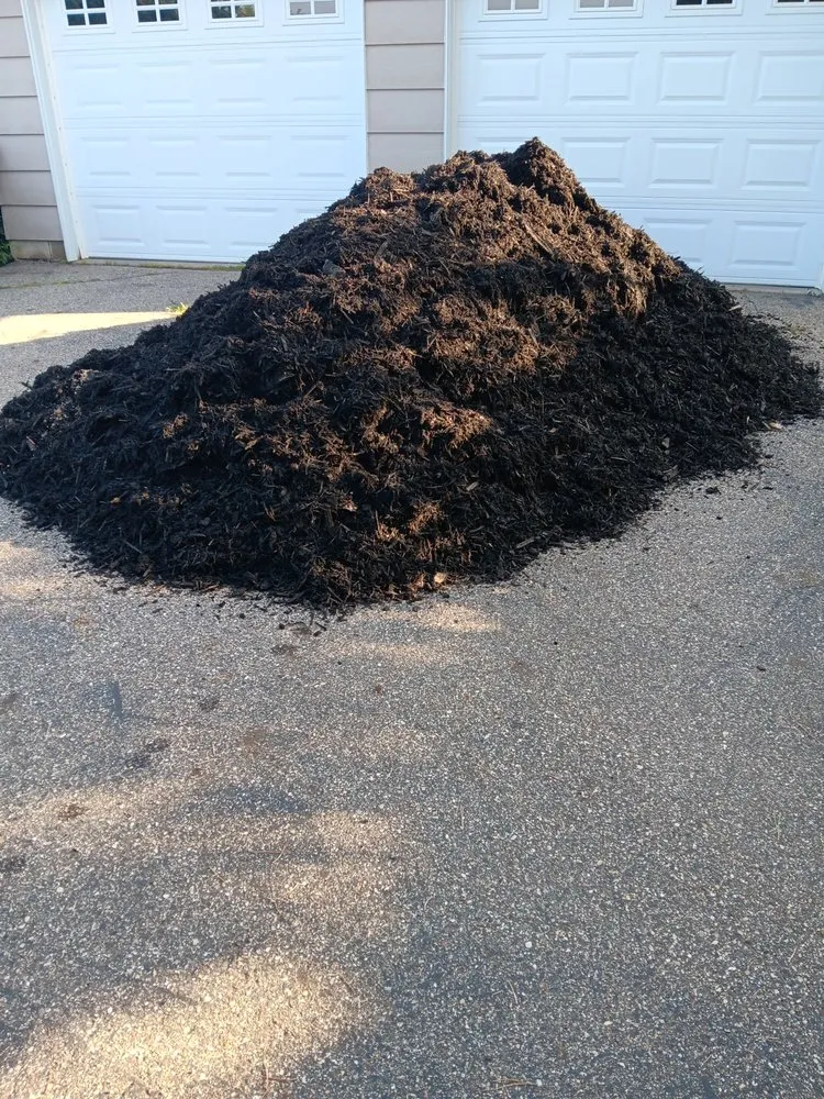 Professional landscape installation in St. Cloud, MN by Enchanted Lakes General Services