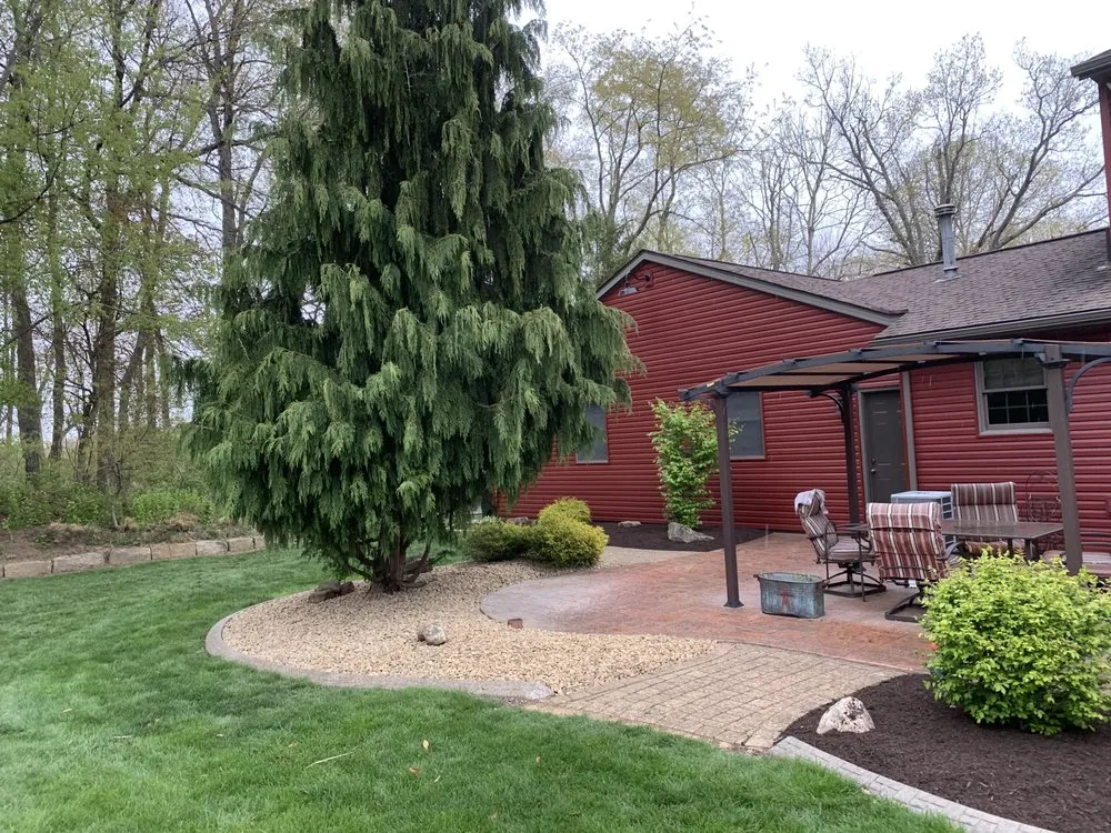 Local yard cleanup service with custom design in Uniontown, OH by Enhanced Homescapes